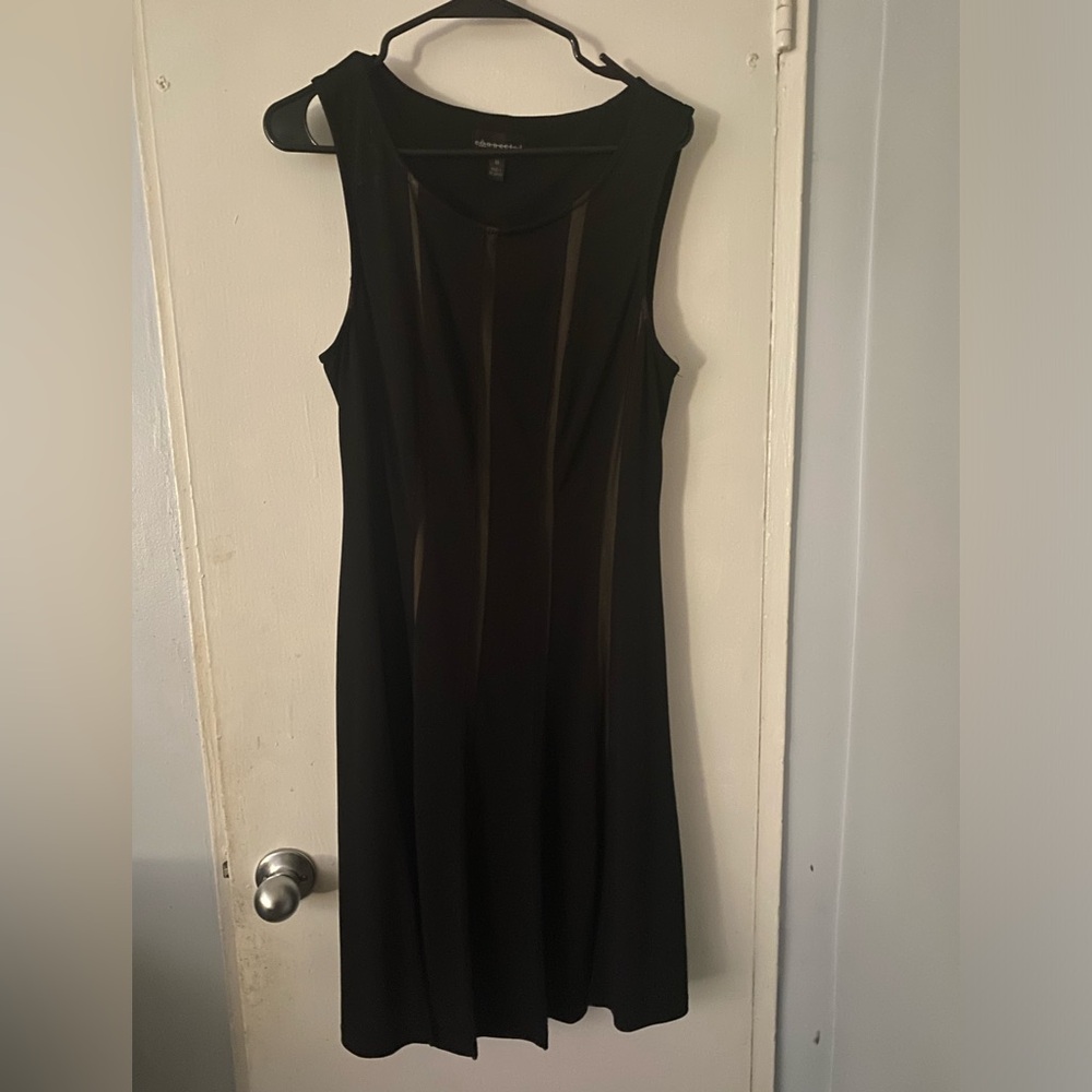 Ultimate little black dress. A Line with nude undertone